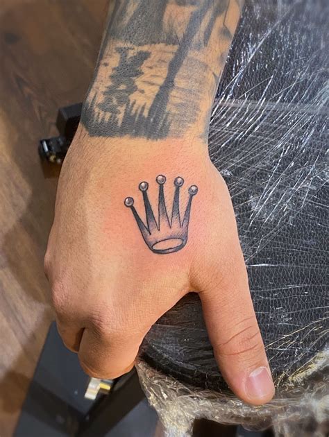 rolex tattoo crown|rolex crown tattoo designs.